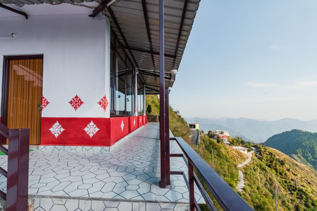 Cabin verandah at Spandan Villas overlooking the Dhanaulti mountain valley